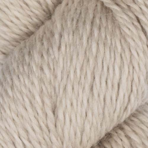 Close-up of beige yarn ball