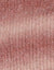 Close-up of pink textured fabric with a gradient effect