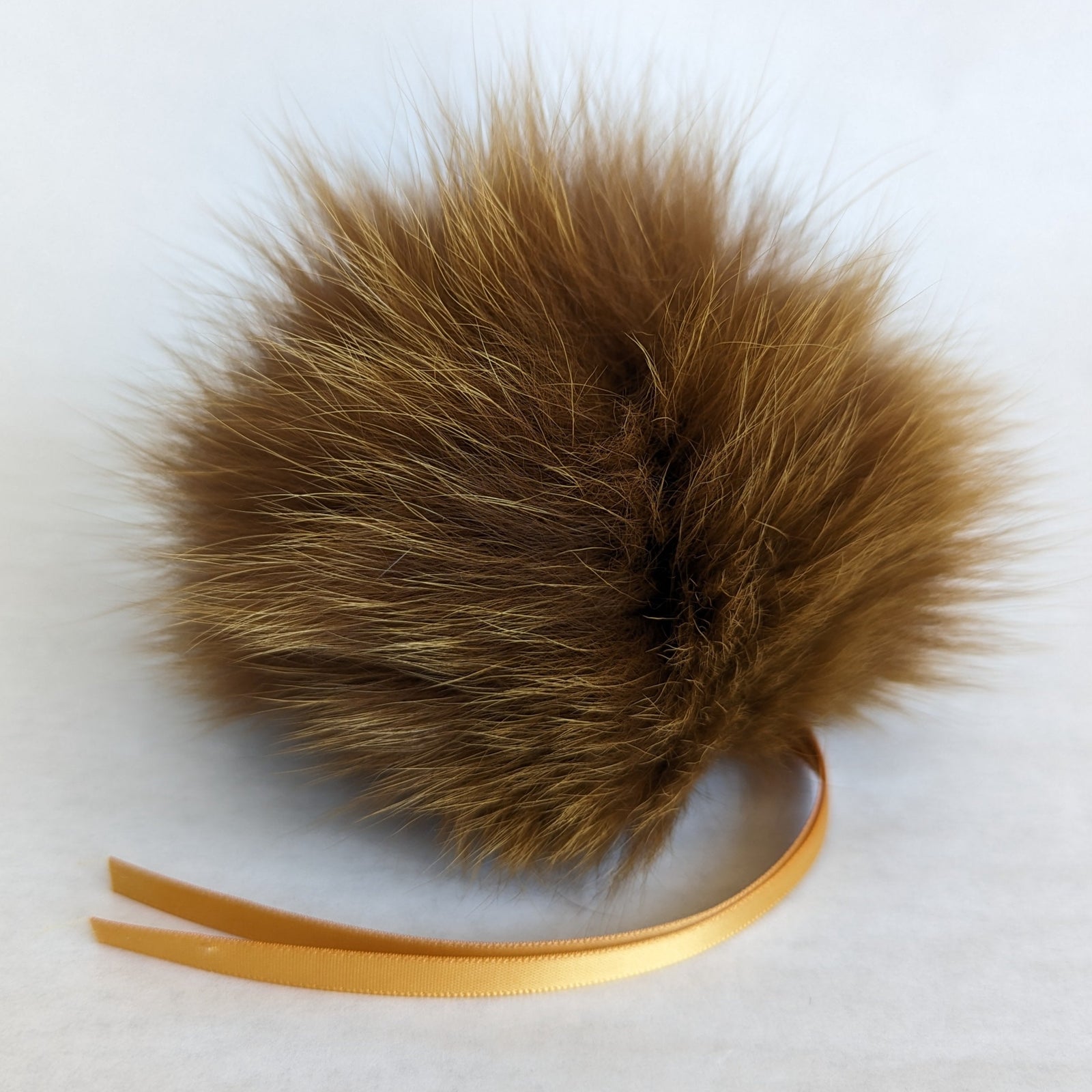 fox fur pom mustard